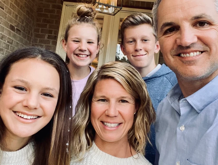 How Faith Is Integrated Into Academics At A Christian School 3 StoneBridge school students and their parents posing for a picture together