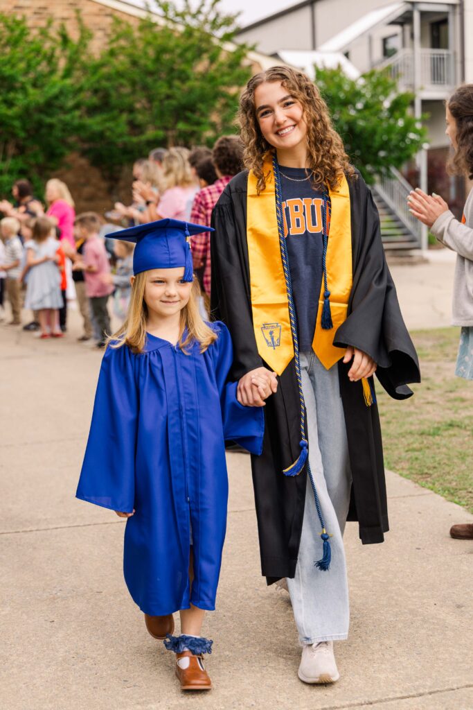 Photo Credit: StoneBridge School. Emily Brady, Class of 2026, Senior-Kindergarten parade.